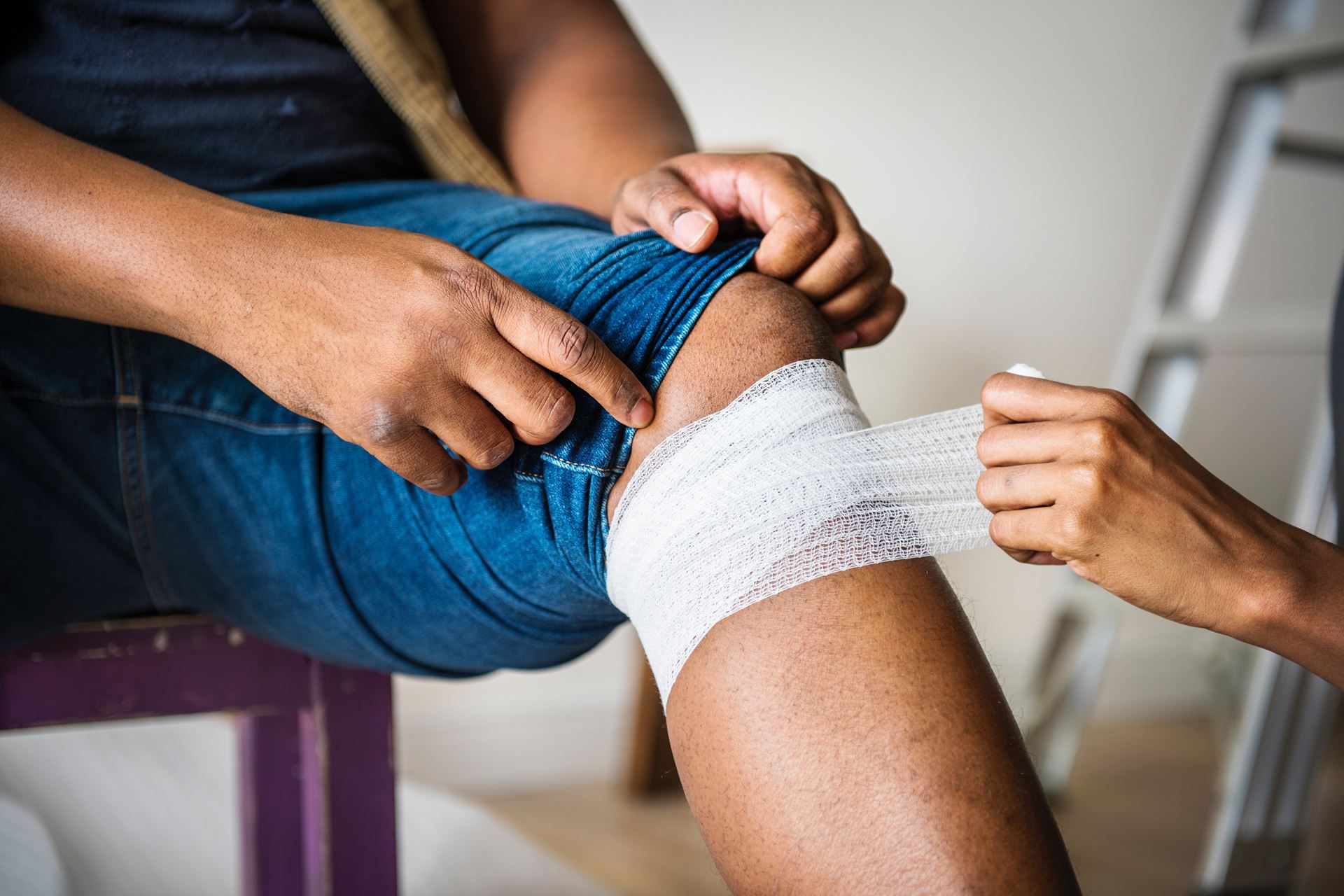 a man with a bandaged knee